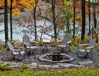 Large fire pit with filtered lake view
